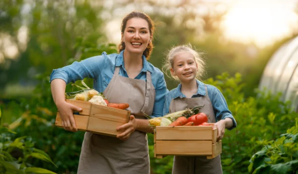 Family harvesting veggies